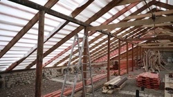 Капремонт крыши завершили в доме по улице Заводской в Александровском